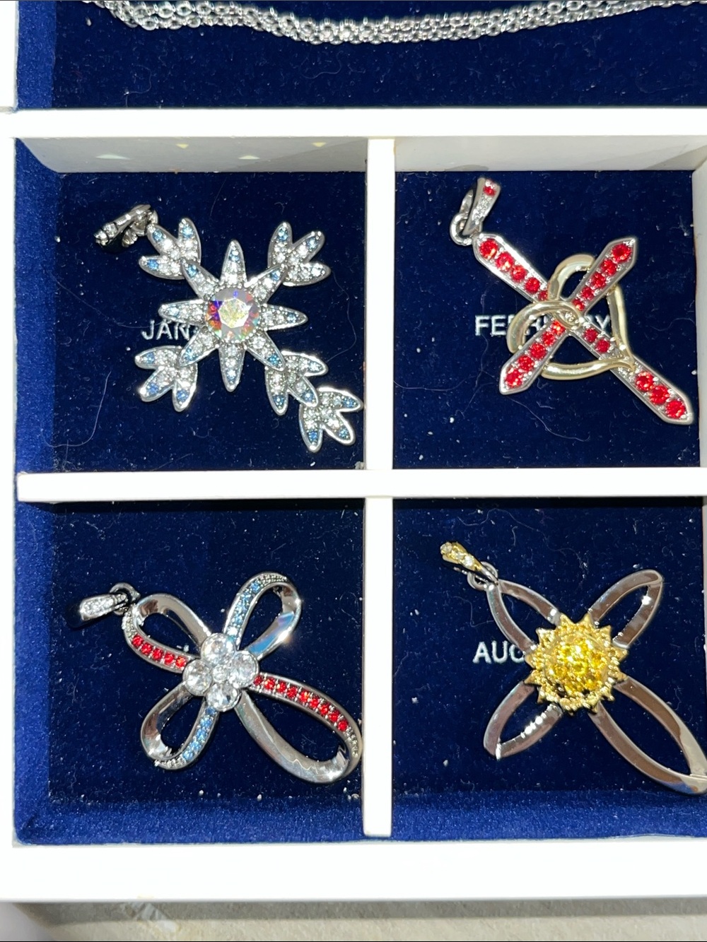 NWOT Cross of the Month Pendant Collection 18" Chain & Showcase Box